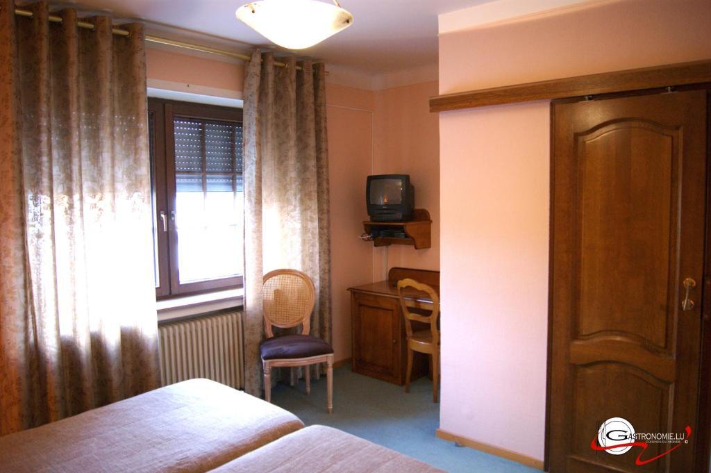 Hotel il Castello Borghese Senningerberg Camera foto