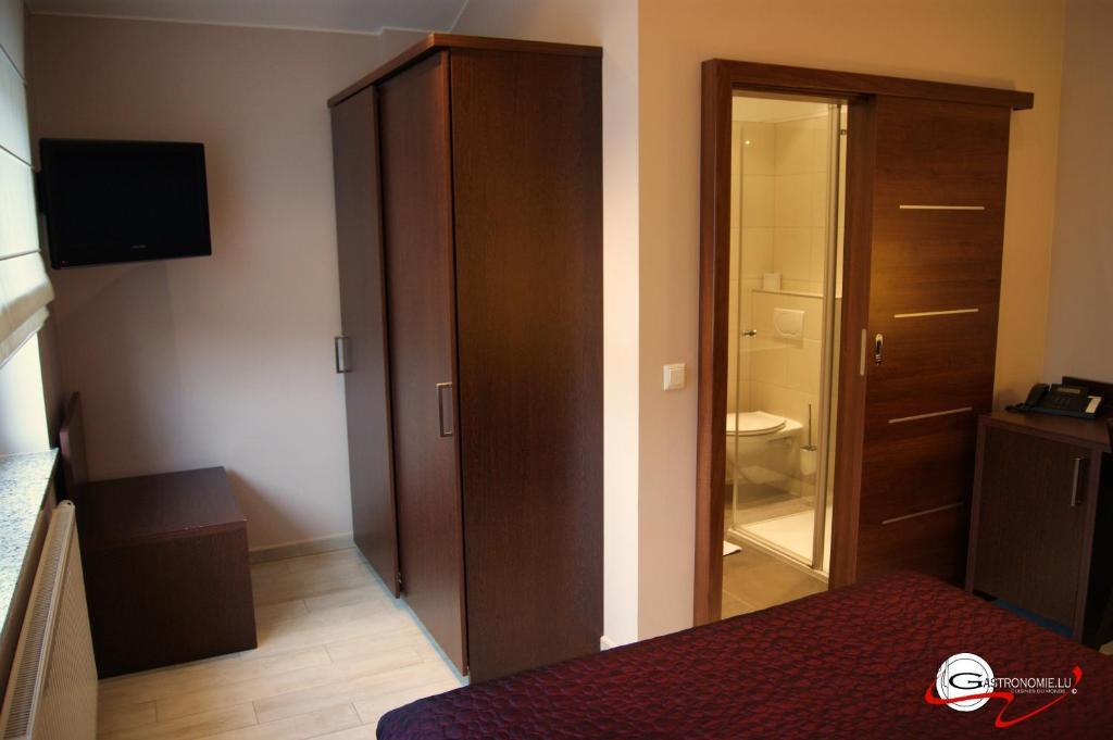 Hotel il Castello Borghese Senningerberg Camera foto